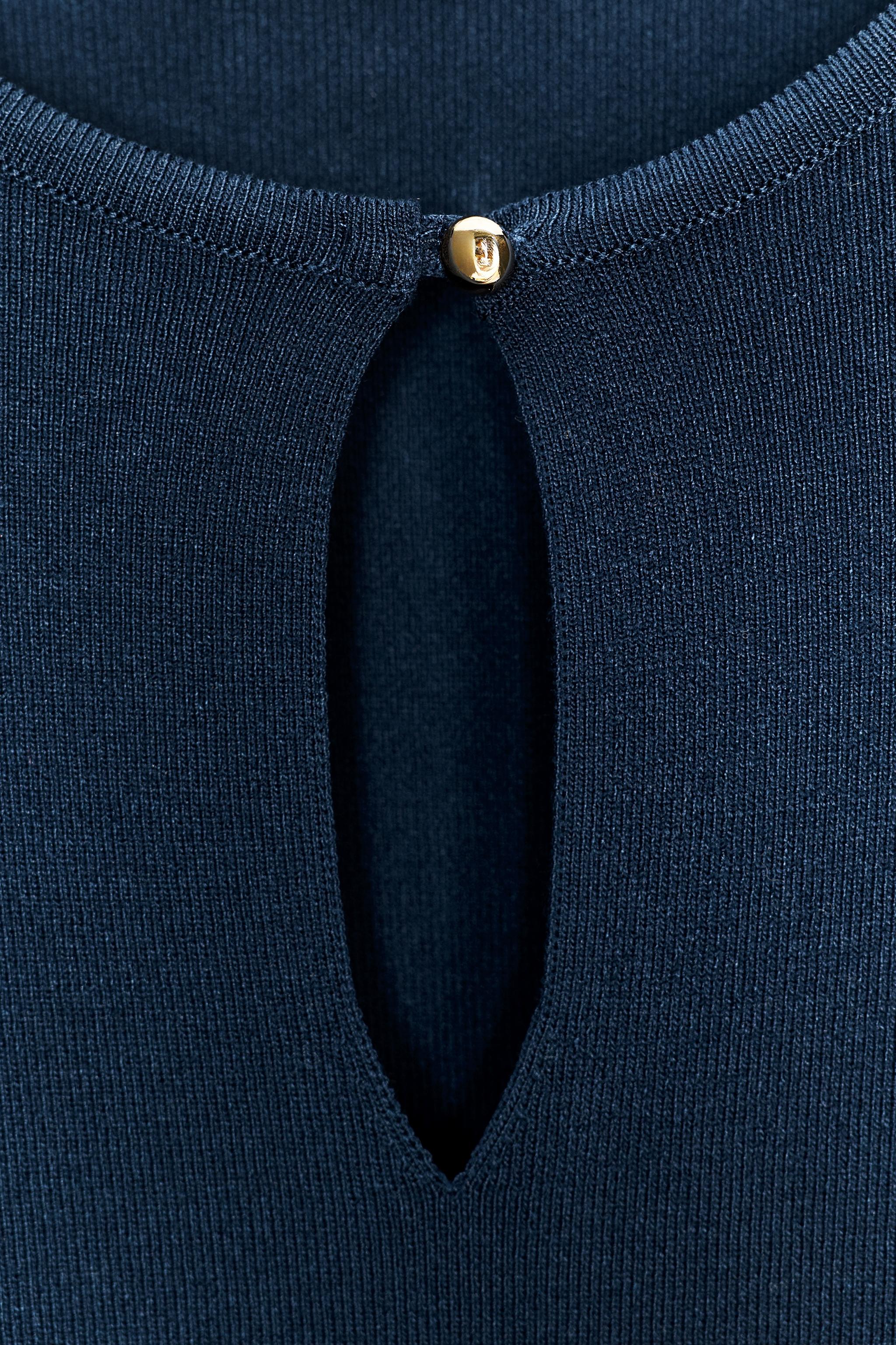 EMBROIDERED EYELET KNIT TOP